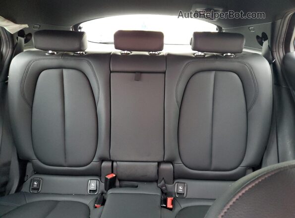 WBXYH9C05L5P36132 2020 BMW X2 Maroon Vista de los asientos traseros