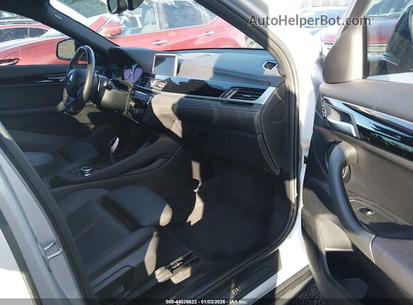 WBXYH9C07L5P40487 2020 BMW X2 Silver Front interior view