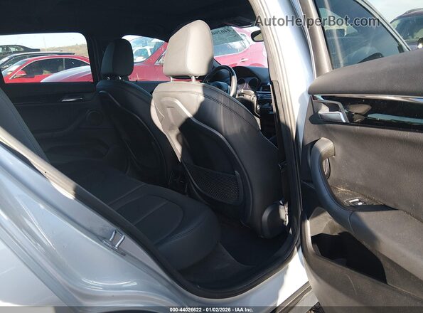 WBXYH9C07L5P40487 2020 BMW X2 Silver VIN sticker view