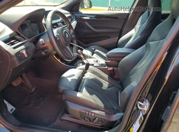 WBXYN1C03L5P49505 2020 BMW X2 Black წინა სალონის ხედი