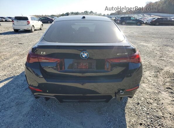 WBY23HD06SFU87731 2025 BMW I4 Black Vista trasera