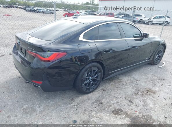 WBY23HD09SFV69307 2025 BMW I4 Black Trasero derecho