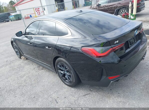 WBY23HD09SFV69307 2025 BMW I4 Black Trasero izquierdo