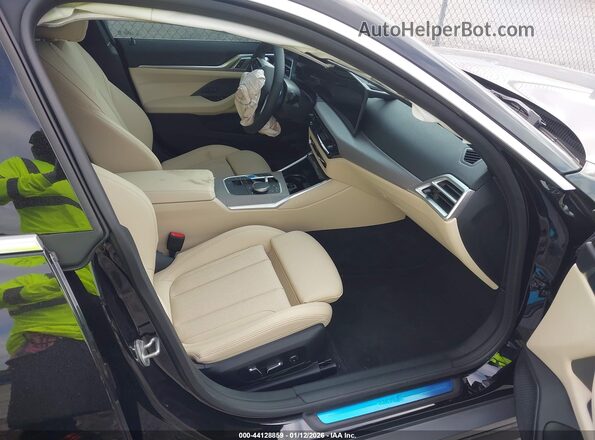 WBY23HD09SFV69307 2025 BMW I4 Black Vista interior delantera