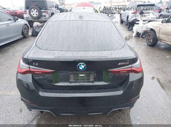 WBY33AW00NFN13317 2022 BMW I4 Black 