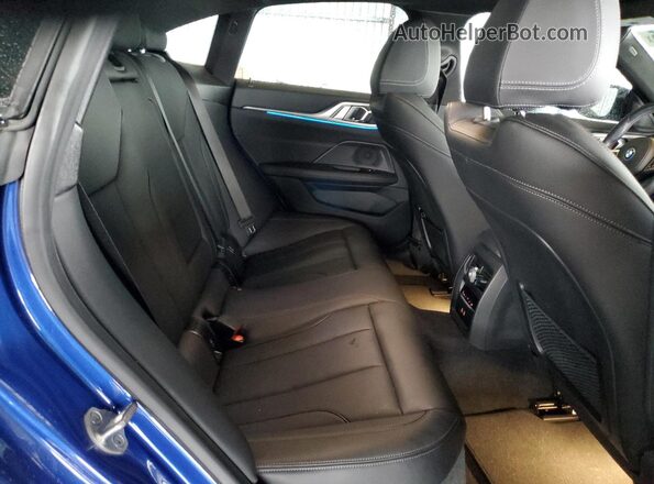 WBY33AW09NFM16553 2022 BMW I4 Blue უკანა სავარძლების ხედი