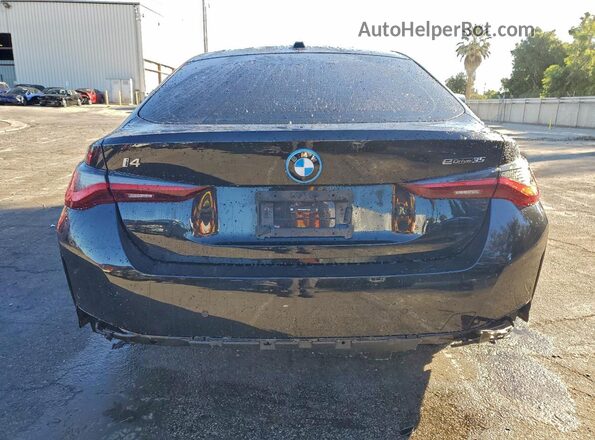 WBY43AW02RFT19883 2024 BMW I4 Black Հետևի տեսք