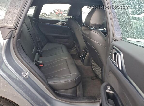 WBY43AW05RFS88337 2024 BMW I4 Gray Vista de los asientos traseros