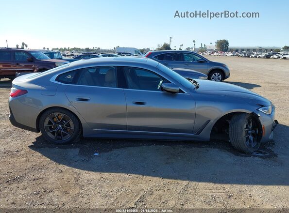WBY73AW06NFN08169 2022 BMW I4 Gray Սալոնի հետևի տեսք