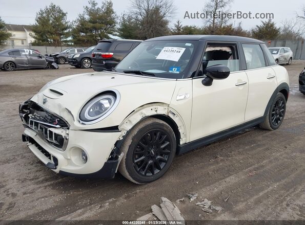 WMWXU9C05L2M56942 2020 MINI HARDTOP White Vista tres cuartos delantera izquierda
