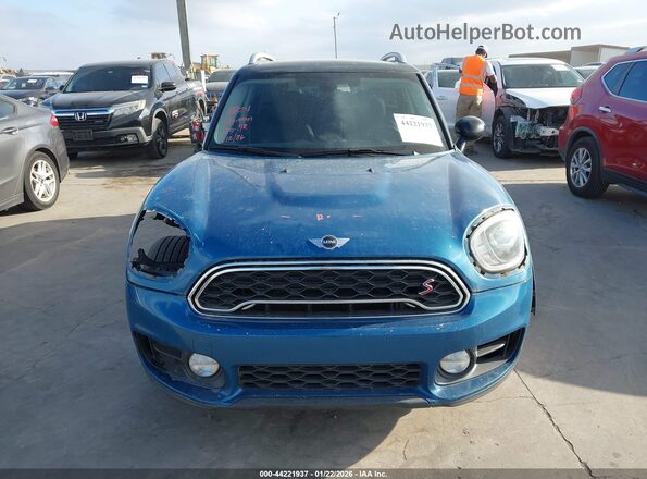 WMZYT5C33J3E61502 2018 MINI COUNTRYMAN Blue Vista interior trasera