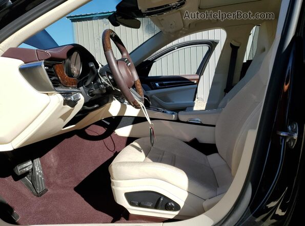 WP0AJ2A79PL102883 2023 PORSCHE PANAMERA Черный Вид салона спереди
