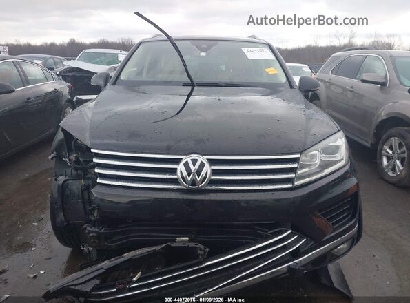 WVGEF9BP3GD010023 2016 VOLKSWAGEN TOUAREG Black Widok wnętrza z tyłu