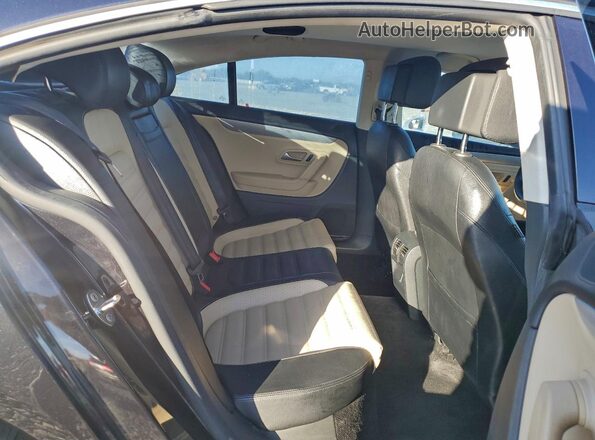 WVWBP7AN0GE504892 2016 VOLKSWAGEN CC Black Rear seats view