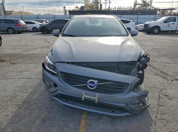 YV140MSLXJ2399497 2018 VOLVO V60 Silver Front view