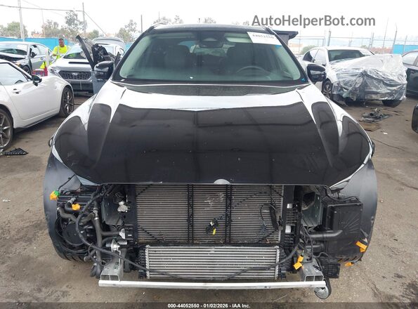 YV4H60DM3R1944927 2024 VOLVO XC60 RECHARGE PLUG-IN HYBRID Black Սալոնի հետևի տեսք