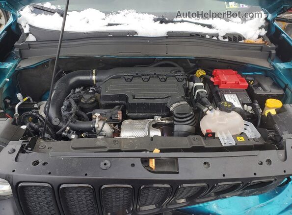 ZACNJDE14NPN98765 2022 JEEP RENEGADE Turquoise Vista interior trasera