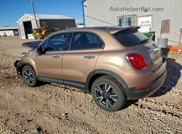 ZFBCFYAB4HP610919 2017 FIAT 500X Желто-коричневый 