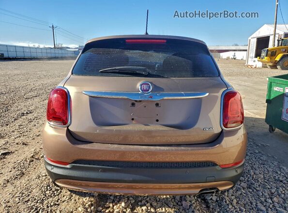 ZFBCFYAB4HP610919 2017 FIAT 500X Желто-коричневый 