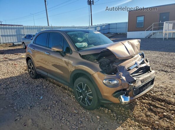 ZFBCFYAB4HP610919 2017 FIAT 500X Желто-коричневый 