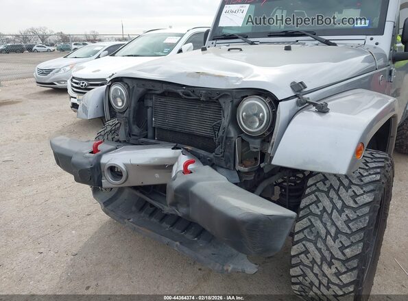 1C4HJWEG9GL111227 2016 JEEP WRANGLER UNLIMITED Gray Widok z przodu