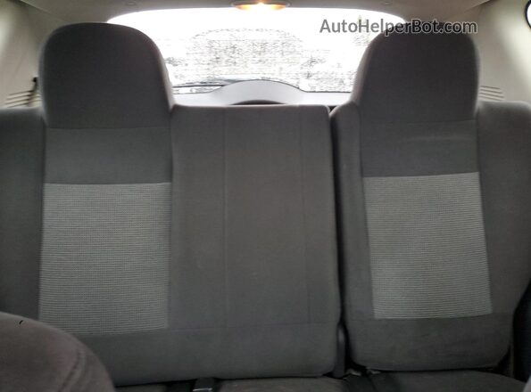 1C4NJDBB9GD662302 2016 JEEP COMPASS White Vista de los asientos traseros