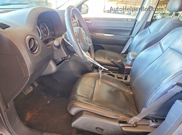1C4NJDEBXGD764669 2016 JEEP COMPASS Gray Widok wnętrza z przodu