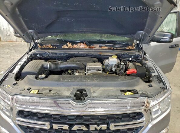 1C6SRFFT4PN685563 2023 RAM 1500 Серебряный Вид задней части салона