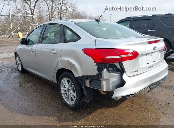 1FADP3F22HL291883 2017 FORD FOCUS Silver Trasero izquierdo