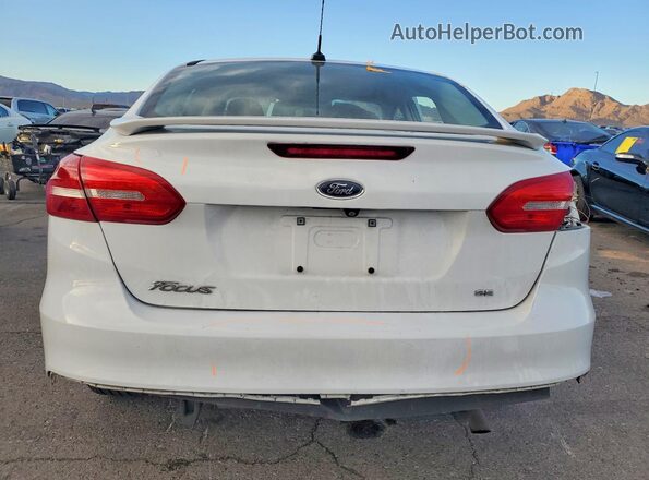 1FADP3F24GL406983 2016 FORD FOCUS Белый Вид сзади