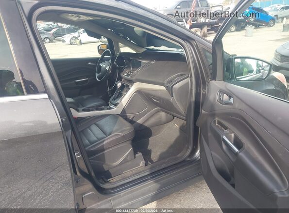 1FADP5CU5GL118990 2016 FORD C-MAX ENERGI Gray Front interior view