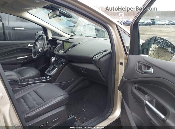 1FADP5FU7HL110693 2017 FORD C-MAX ENERGI Tan Вид салону спереду