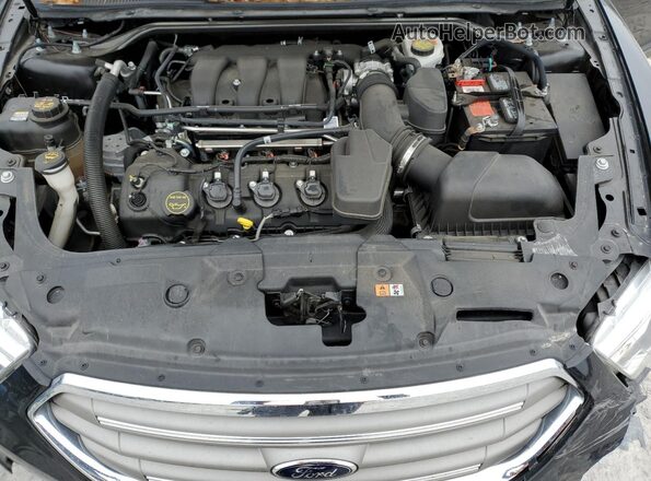 1FAHP2D82JG136784 2018 FORD TAURUS Black Rear interior view