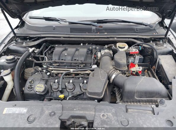 1FAHP2F89HG104602 2017 FORD TAURUS Серебряный Вид сзади
