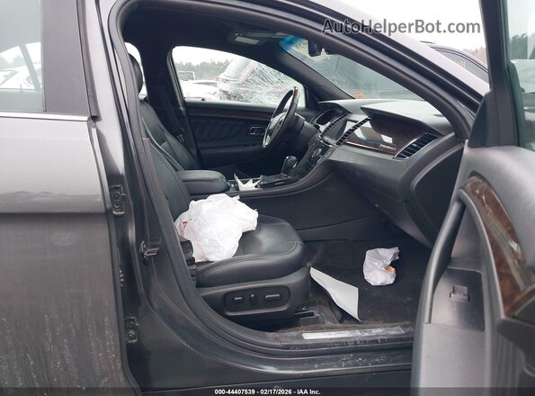 1FAHP2F89HG104602 2017 FORD TAURUS Серебряный Вид салона спереди