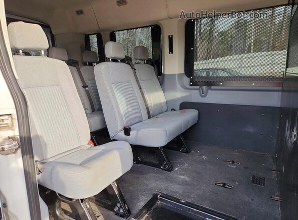 1FBAX2CM9GKB12311 2016 FORD PASSENGER White Rear interior view