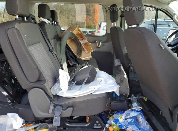 1FBAX2YG5RKA28847 2024 FORD PASSENGER White Vista interior trasera