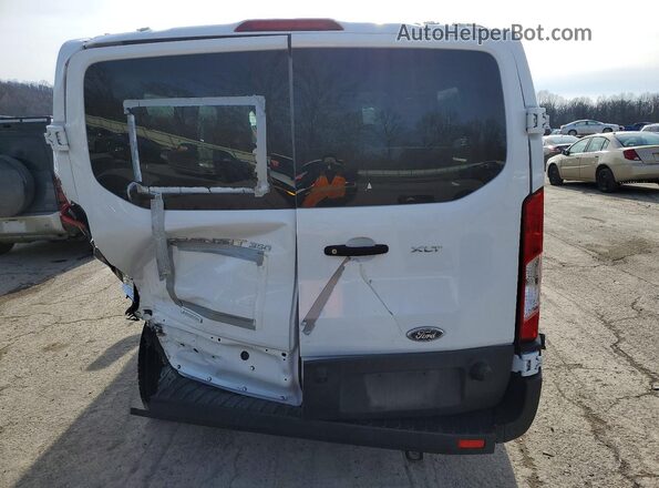 1FBAX2YG5RKA28847 2024 FORD PASSENGER White Vista trasera