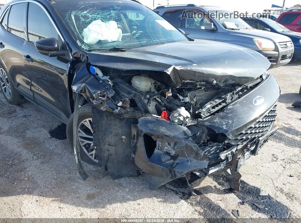 1FMCU0H69LUB81070 2020 FORD ESCAPE Black Widok z przodu