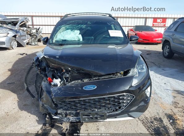 1FMCU0H69LUB81070 2020 FORD ESCAPE Black Widok wnętrza z tyłu
