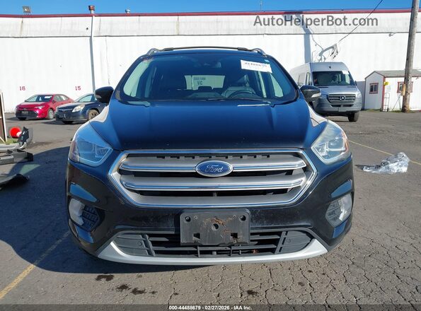 1FMCU9J98HUF09045 2017 FORD ESCAPE Black Widok wnętrza z tyłu