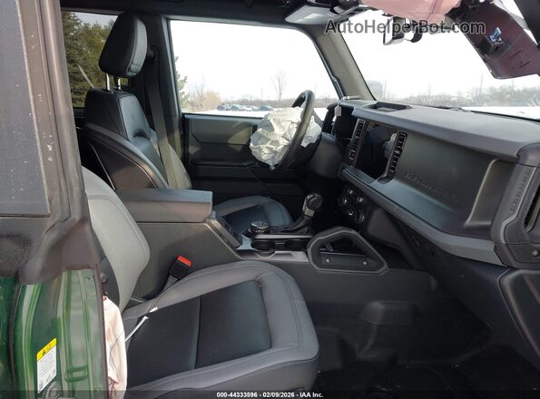 1FMDE7BHXRLB36755 2024 FORD BRONCO Зеленый Вид салона спереди