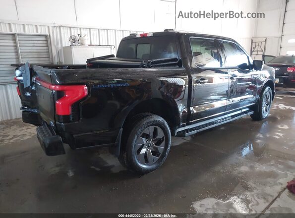 1FT6W5L70RWG31582 2024 FORD F-150 LIGHTNING Black 