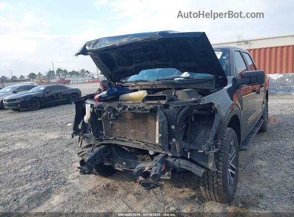 1FTFW1E56PFA48547 2023 FORD F150 Черный Вид спереди