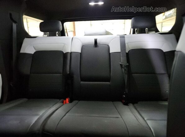 1GKB0NDEXRU106655 2024 GMC HUMMER Черный Вид задних сидений