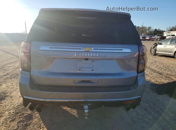 1GNSCSKDXRR396465 2024 CHEVROLET TAHOE Silver Rear view