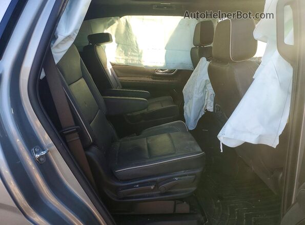 1GNSCSKDXRR396465 2024 CHEVROLET TAHOE Silver Rear interior view