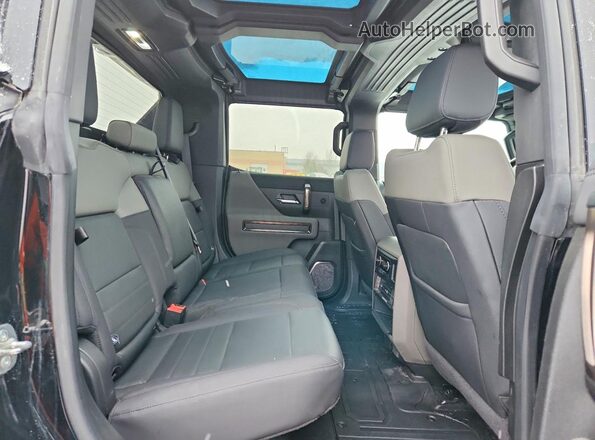 1GT40DDAXRU107218 2024 GMC HUMMER Черный Вид задней части салона