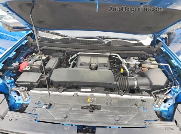 1GTP6EEK5R1230788 2024 GMC CANYON Blue Вид задньої частини салону