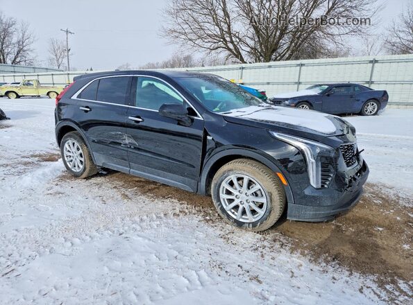 1GYAZAR40MF079690 2021 CADILLAC XT4 Black Delantero derecho